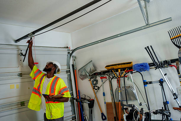 Professional Garage Door Panel Replacement technician working in Media, PA